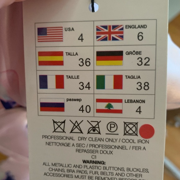 Beautiful unique 2 piece dress. Never worn has tags . Runs a lil small - Picture 2 of 5